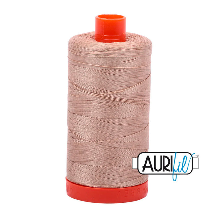 Beige 2314 Thread by Aurifil. Sold by Canadian online fabric store Woven Fabric Gallery.