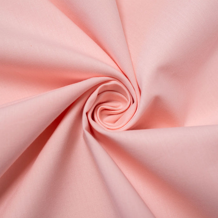 Blush organic solid from Birch Fabrics. Sold by Canadian online fabric store Woven Fabric Gallery.