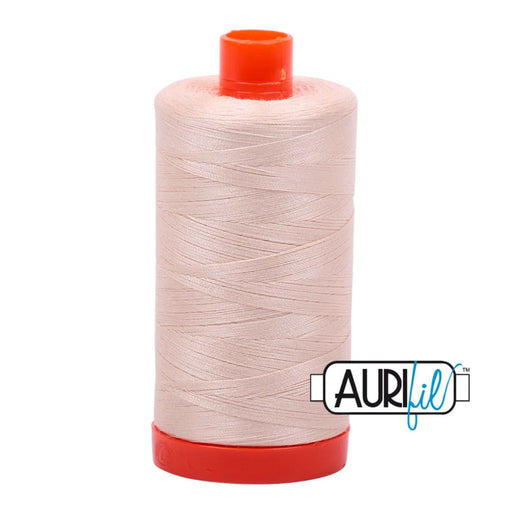 Aurifil Thread Light Sand  2000 50 wt. Sold by Canadian online fabric store Woven Fabric Gallery.