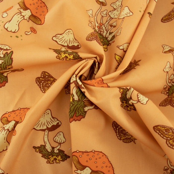 Mushrooms Peachy organic fabric from Birch Fabrics. Sold by Canadian online fabric store Woven Fabric Gallery.
