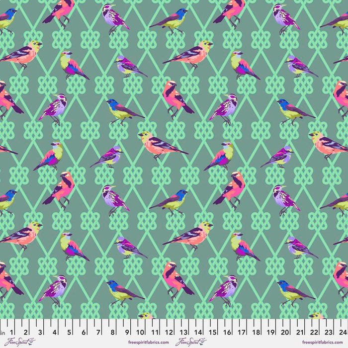 In a Finch Dusk fabric by Tula Pink. Sold by Canadian online fabric store Woven Fabric Gallery.
