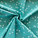 Wink Teal organic fabric form Birch Fabrics. Sold by Canadian online fabric store Woven Fabric Gallery. 